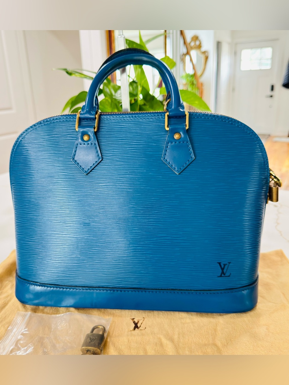 Louis Vuitton Blue Epi Alma Satchel with Gold Hardware